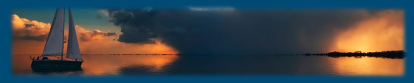 sailboat on ocean at sunset